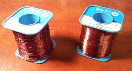 Two spools of enameled copper wire. #24 at left, #34 at right.